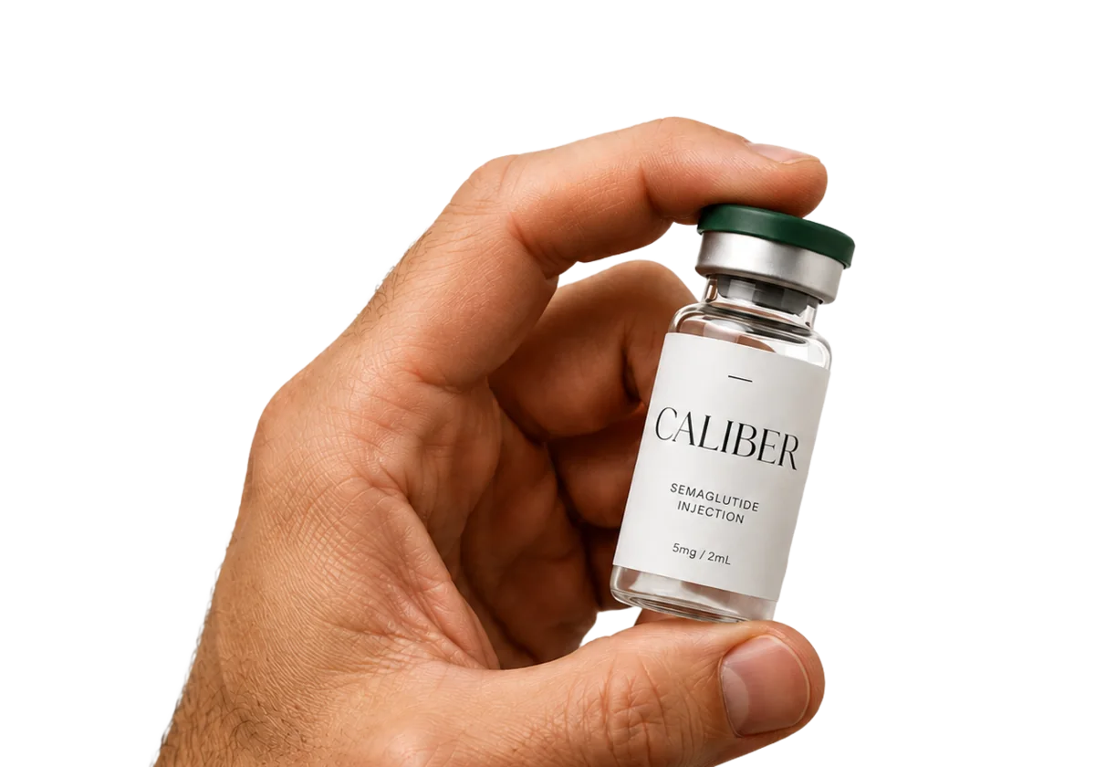 Caliber compounded semaglutide vial, held in hand